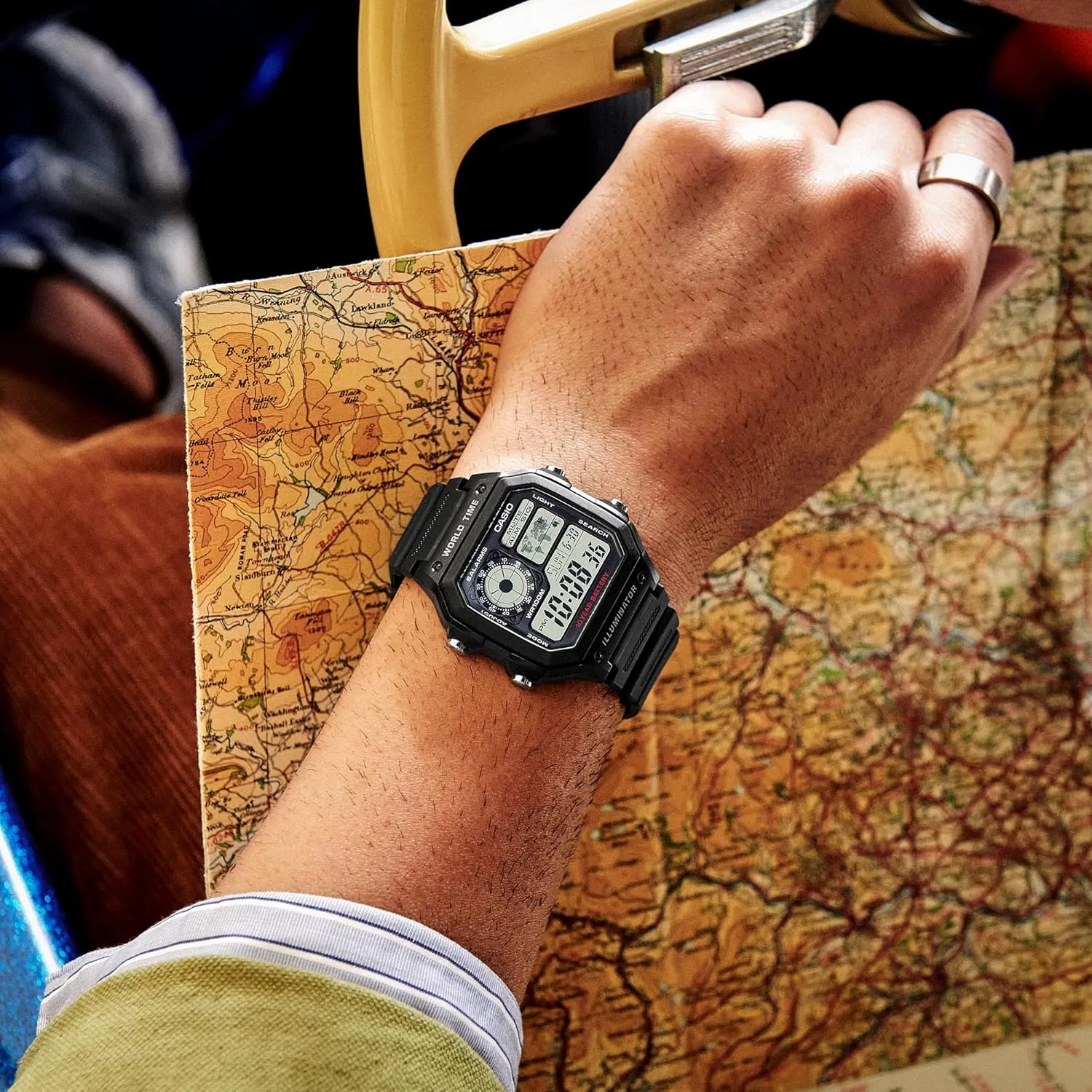 Casio AE1200WH Series | Mens Digital Watch | 100M WR | Multi Alarms | 100 SEC Stopwatch | Countdown Timer | World Map for World Time | LED Light | LC Analog Display | 10 Year Battery